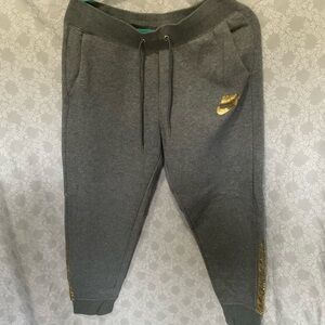 Nike Kids Charcoal Joggers with Gold Details